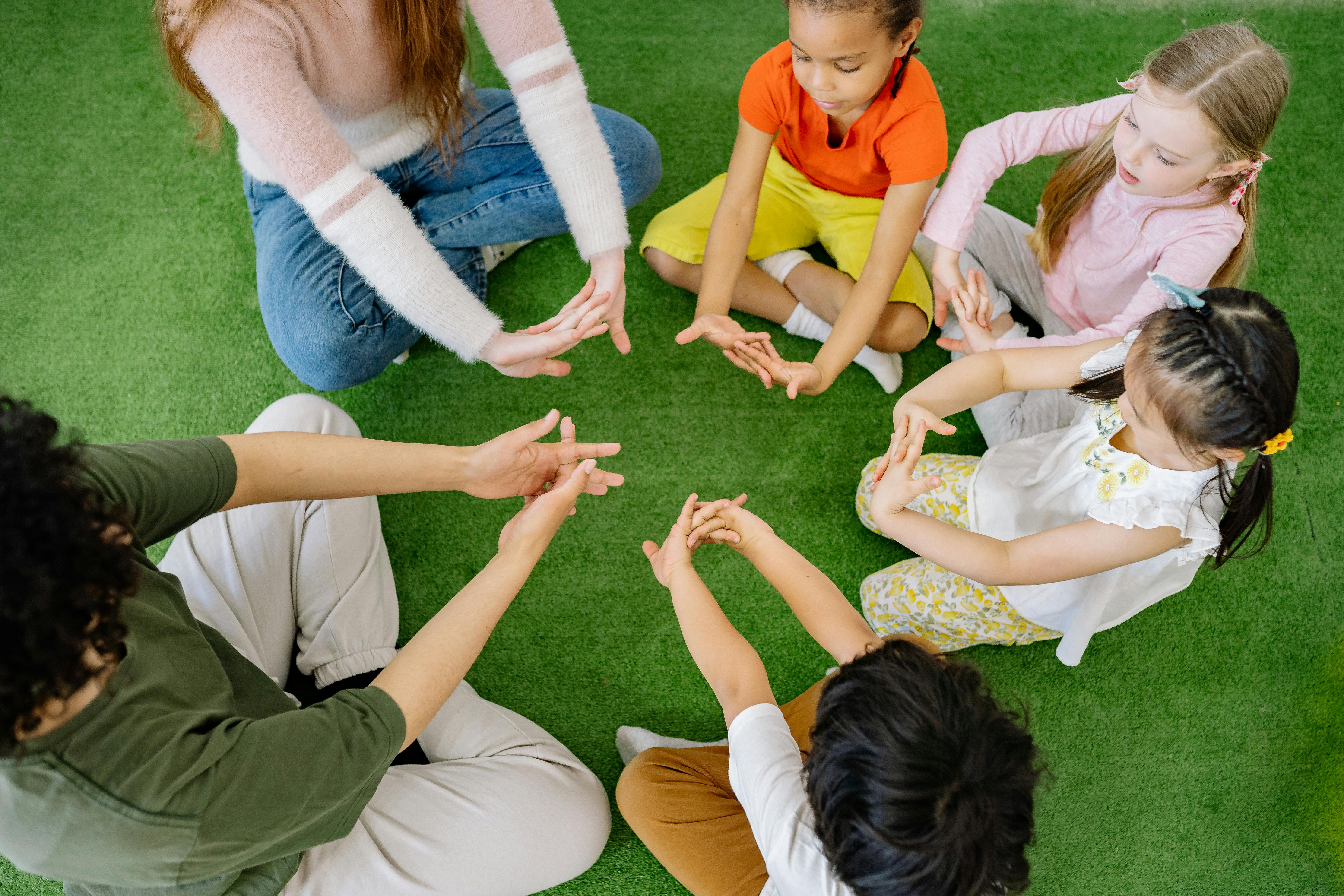 children sitting in a ring